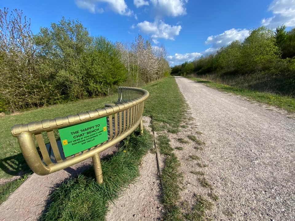 The "happy to chat" bench, which can be found along High Trail